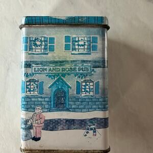 Vintage Fabri-Centers Metal Tin Lion and Rose Pub Christmas ornament 1995